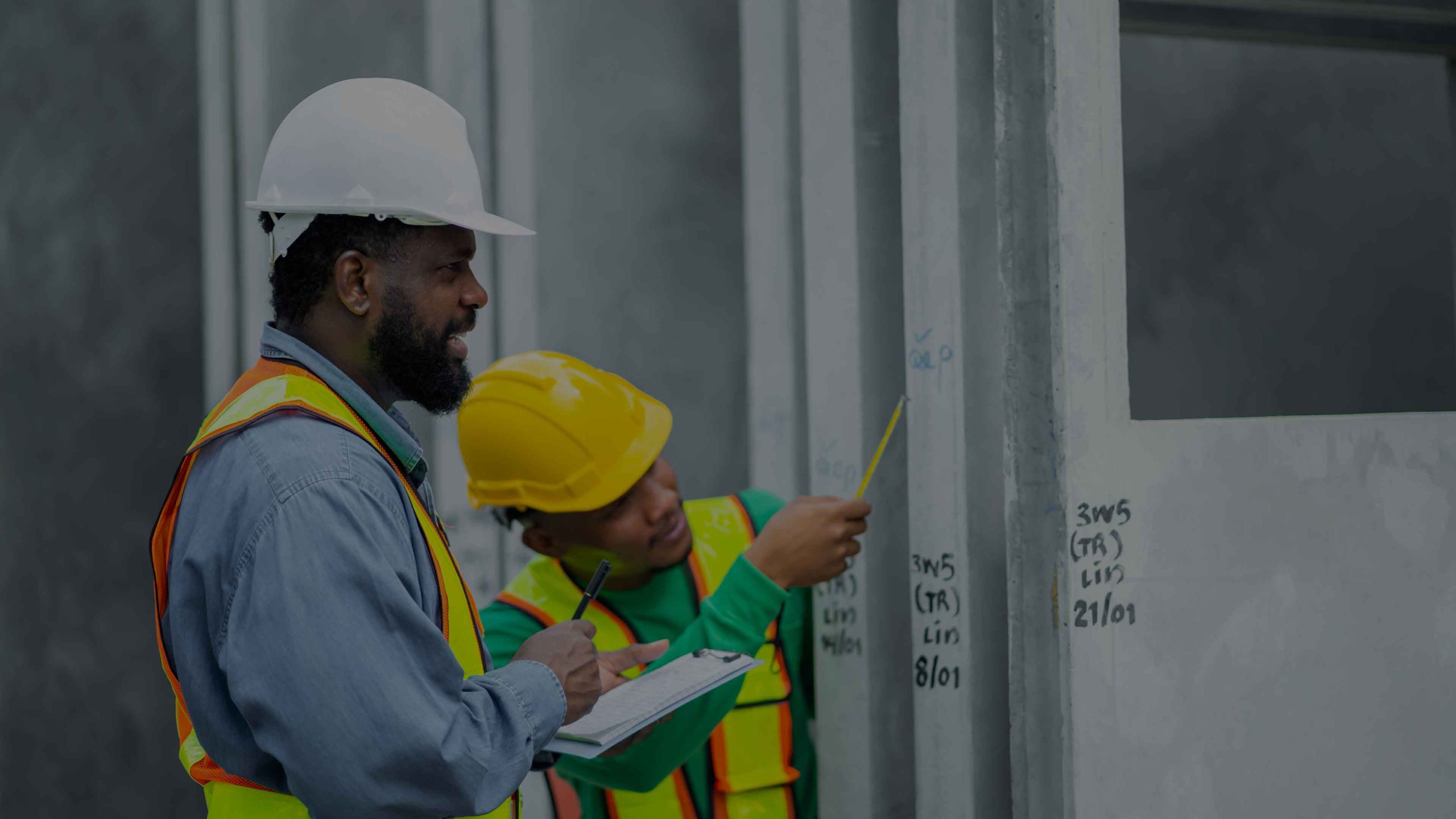 Construction engineers team using blueprint of proj ... Professional construction engineers team using blueprint of project plan brainstorming and working together at construction building, Architecture and building construction concept